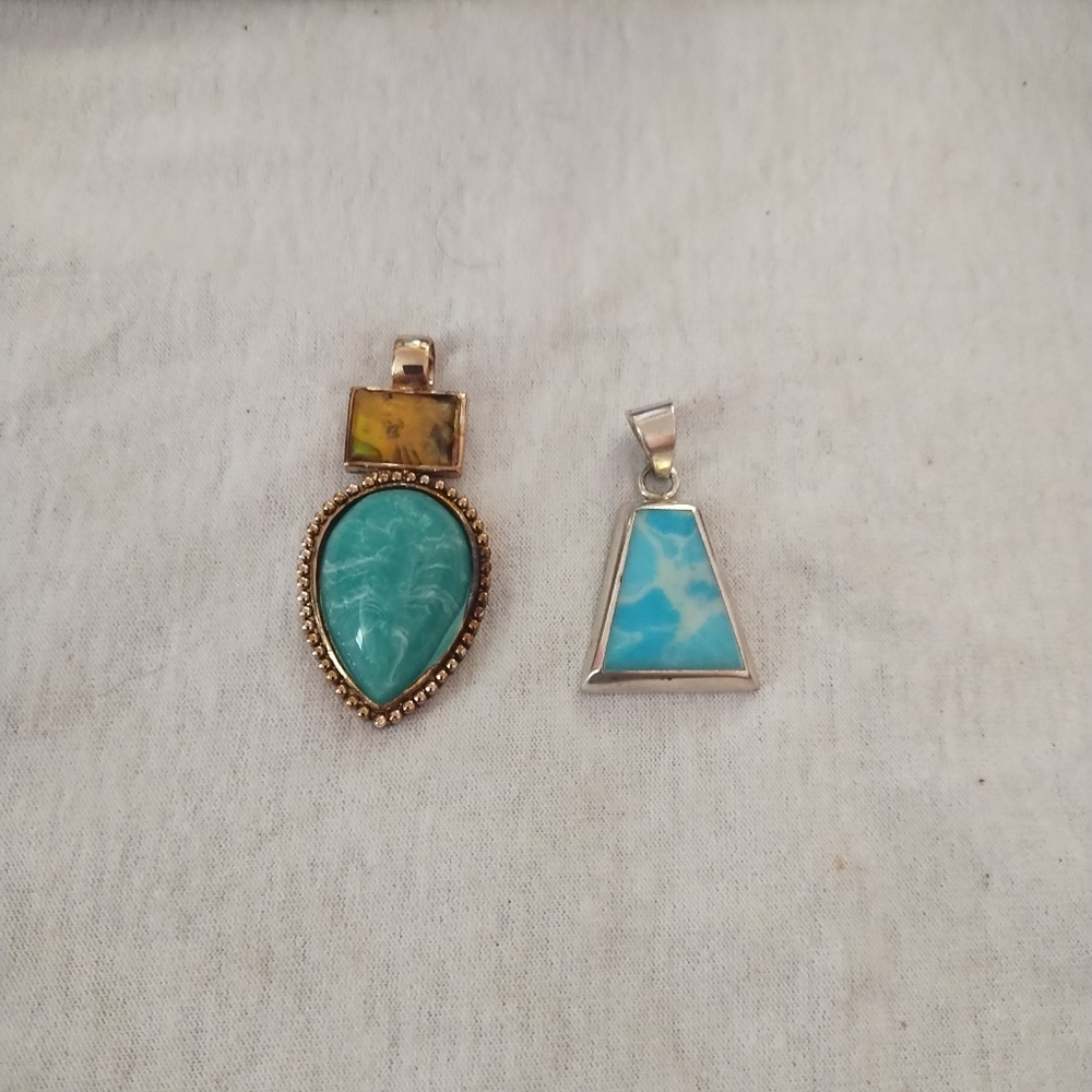 2 Pendants silver and gold toned